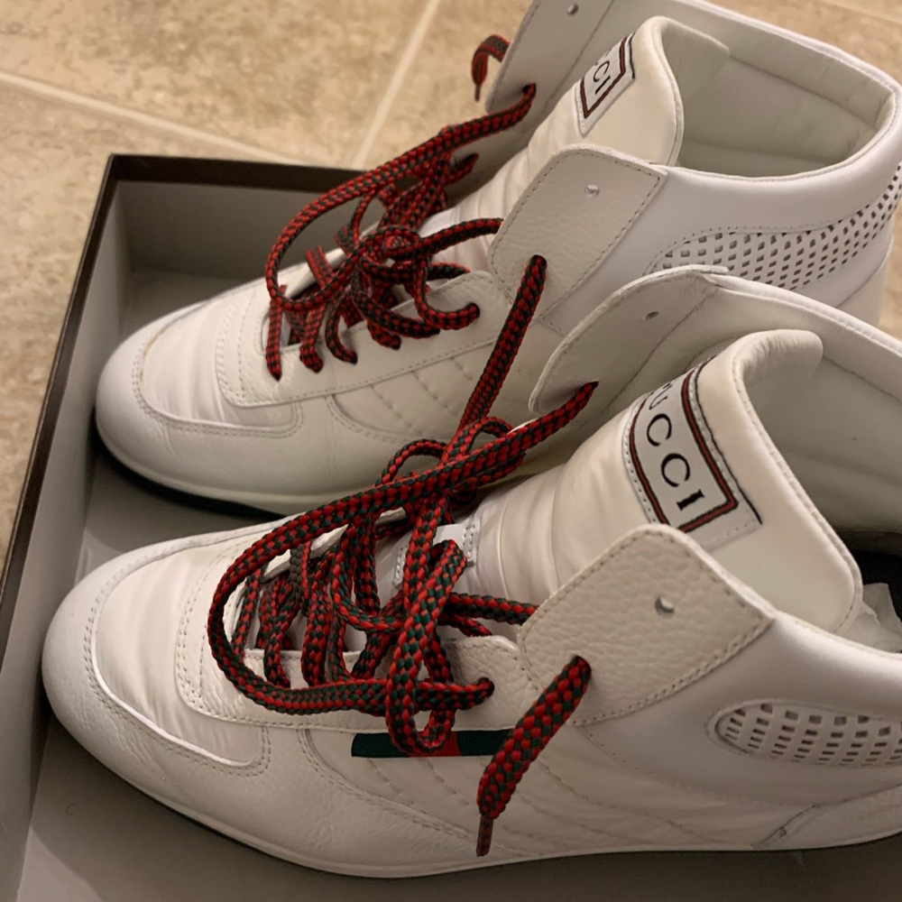 High top Gucci white sneakers… 2 minor scuffs on on sneaker price negotiable